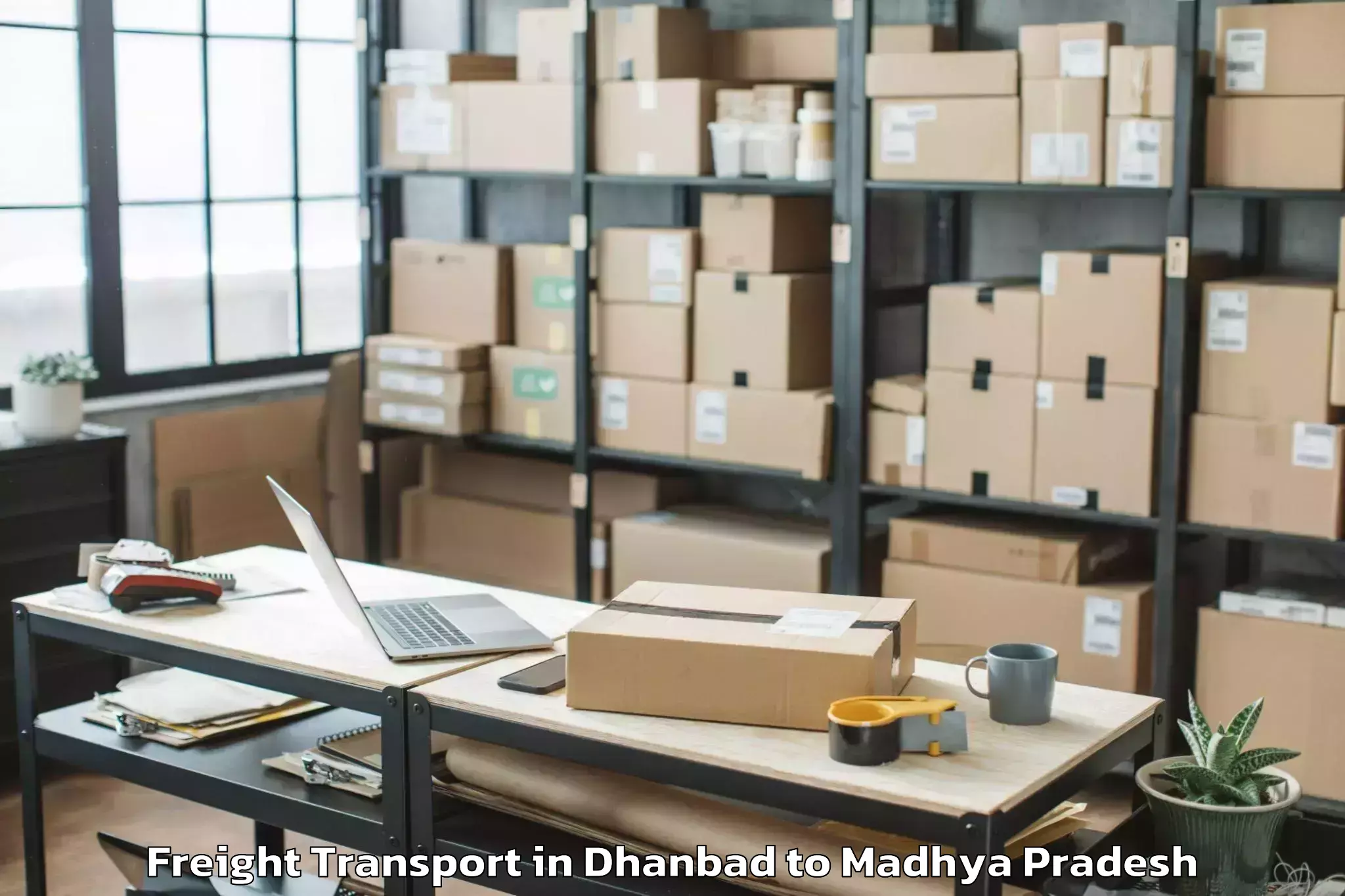 Book Dhanbad to Rajiv Gandhi Proudyogiki Vishw Freight Transport Online